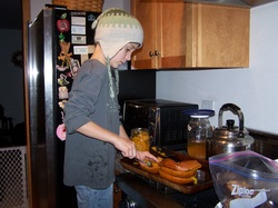 My son preparing roasted pumpkin last year.